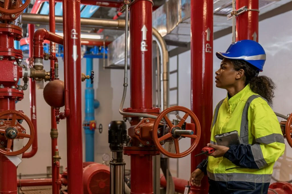 Engineer or technician work checking Fire suppression system and fire equipment.